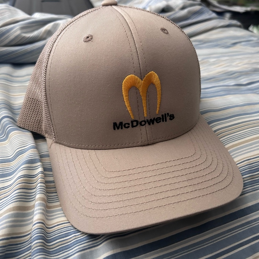 McDowell’s trucker hat